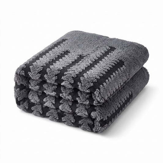 FlauschFit Jacquard-Sofaüberwurf zusammengelegt