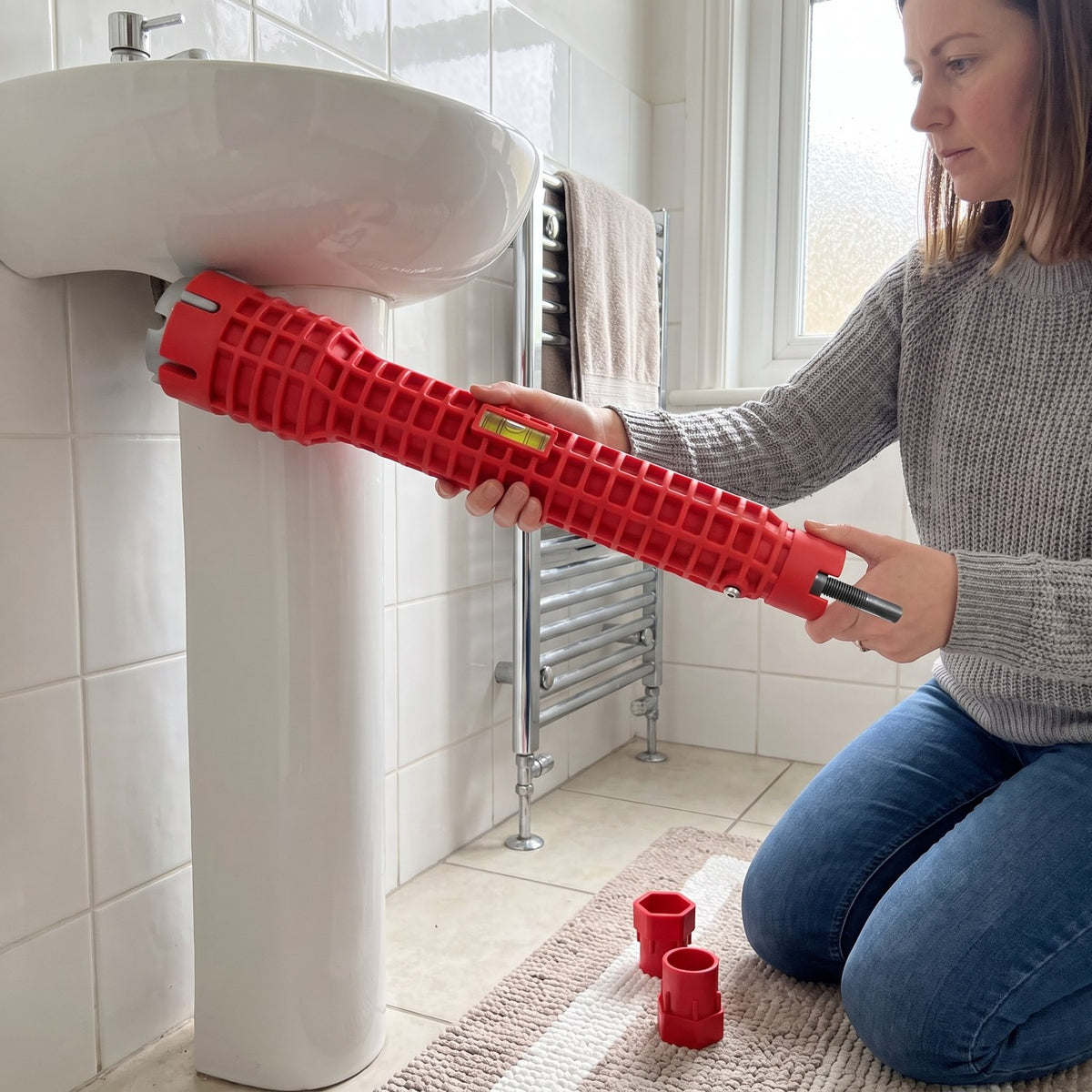 SpülFix unter dem Waschtisch im Bad